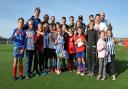 A group of Ukrainian refugees with Brighton players and coaches
