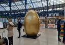 People travelling through Brighton Station spotted the giant egg promoting the star-studded pantomime