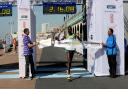 Phiemon Kiprok crosses the line to take the Brighton Marathon 2011