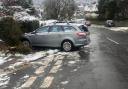A car skidded off the road and into a hedge in Patcham
