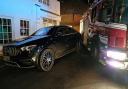 A Mercedes Benz blocked a fire engine that was on call