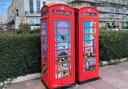 Two of the classic phone boxes on Marine Parade