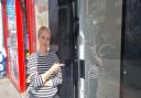 Helga Starup Williams is furious that the council has threatened fines for graffiti on her salon's door