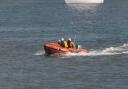RNLI crews saved two children from an inflatable kayak as it was blown out to sea
