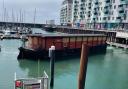 The historic barge has left Brighton Marina for the last time as it is towed to its new home in Battersea