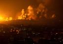 Fire and smoke after an Israeli airstrike in Gaza City on Sunday (Fatima Shbair/AP)