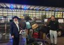 Rabbi Efune and footballer Tomer Hemed at Heathrow Terminal 4