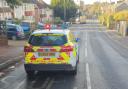 Updates after car crashes into power cable - road closed
