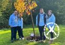 Martin Cosser, daughter Eloise, son Adam and  wife Tara next to the tree planted in Charlie's memory on his 18th birthday