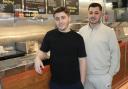Sahin Saglam, left, and Hamit Ermis have set up a initiative to give free fish and chips to those in need