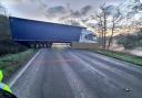 Updates as jack-knifed lorry closes road