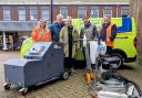 The Gladiator is being used to tackle chewing gum. From left, councillor Wendy Maples, Chris Ketley and Guy McQueen, the council’s regeneration project manager, with street cleansing staff