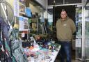 James Lock and his friends sell fishing tackle and use the profits for a foodbank. Pictured is James at his Aquarium in Eastbourne