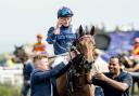 Tom Marquand celebrates success in the Brighton Bullet