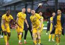 James Milner leads the celebrations at full-time