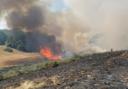 Live updates as fire crews tackle blaze in field near railway line