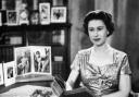 Queen Elizabeth II, in the Long Library at Sandringham, after making the first televised Christmas day broadcast to the nation in 1957