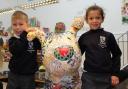 Lancing Prep School pupils pose proudly with their decorated snowpuppy.