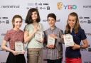The four YGD winners, from left to right; Emily Mitchell (winner of the Game Making 15-18 years award), Elsie Mae Williams (winner of the Game Concept 10-14 years award), Spruce Campbell (winner of the Game Making 10-14 years award) & Anna Carter (winner