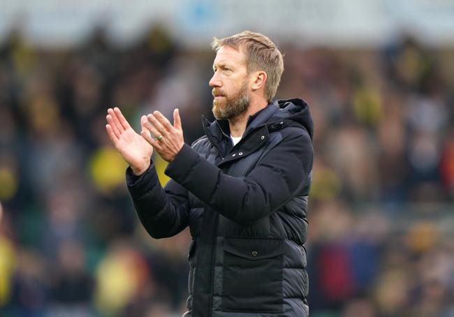 Brighton and Hove Albion manager Graham Potter applauds the fans after the Premier League match at Carrow Road, Norwich. Picture date: Saturday October 16, 2021..