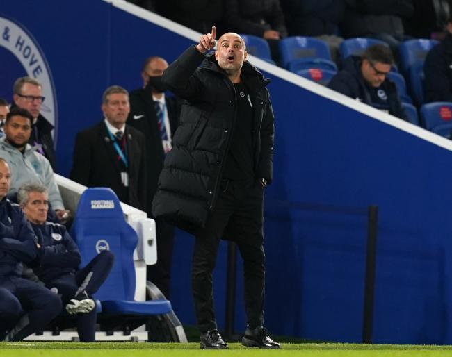 Manchester City manager Pep Guardiola on the touchline during the Premier League match at the AMEX Stadium, Brighton. Picture date: Saturday October 23, 2021