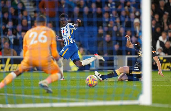 Brighton and Hove Albion's Tariq Lamptey (centre) shoots towards goal during the Premier League match at the AMEX Stadium, Brighton. Picture date: Saturday November 6, 2021.