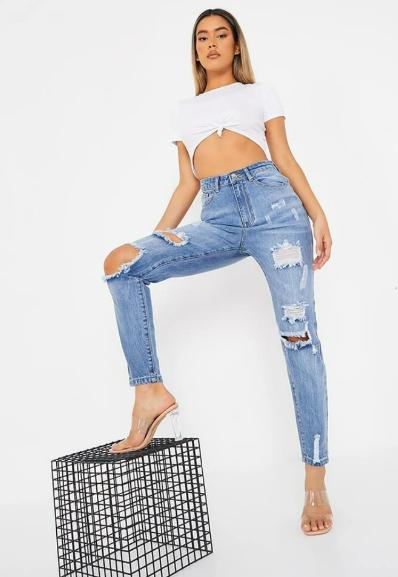 The Argus: Vintage Wash Ripped And Distressed Mom Jeans. Credit: I Saw It First