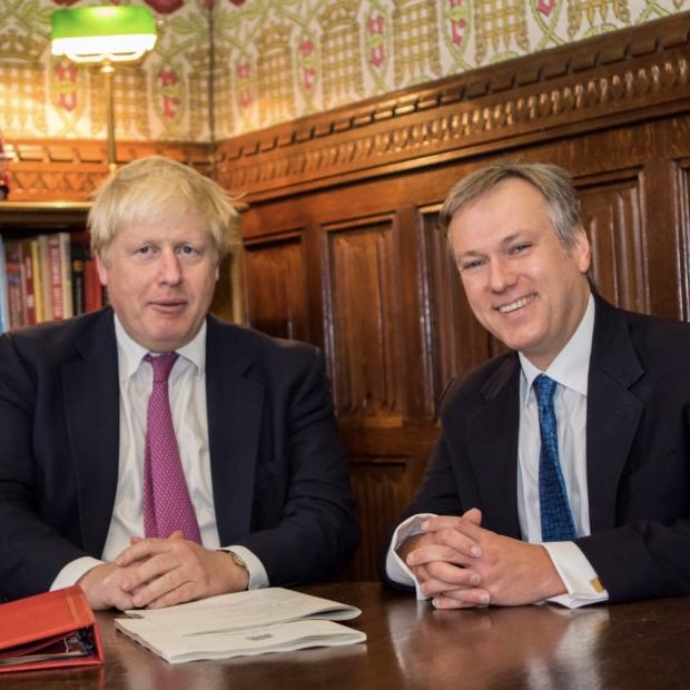 The Argus: Prime Minister Boris Johnson (left) and Crawley MP Henry Smith 