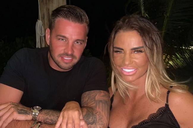 Katie Price (right) with her fiancé Carl Woods