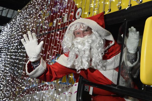 The Argus: Santa was hit in the fact by the sweets while standing on top of the bus 