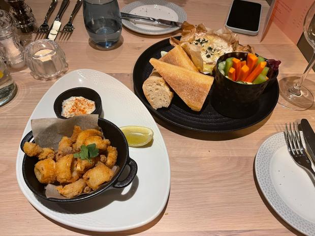The Argus: CALAMARI lightly dusted squid with a lemon and garlic mayonnaise and baked Normandy Isigny Camembert with French baguette, crudités and onion marmalade