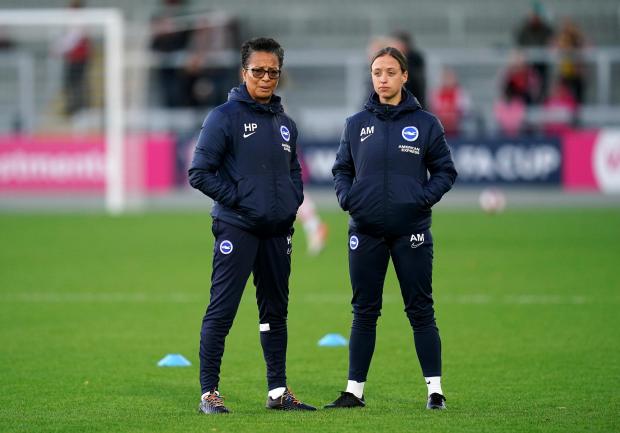The Argus: Brighton and Hove Albion manager Hope Powell (left) and assistant manager Amy Merricks watch the warm up