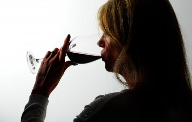 The Argus: A woman drinking red wine. Credit: PA