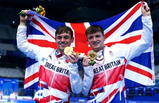 The Argus: Tom Daley (left) and Matty Lee have been made MBEs. Picture: PA