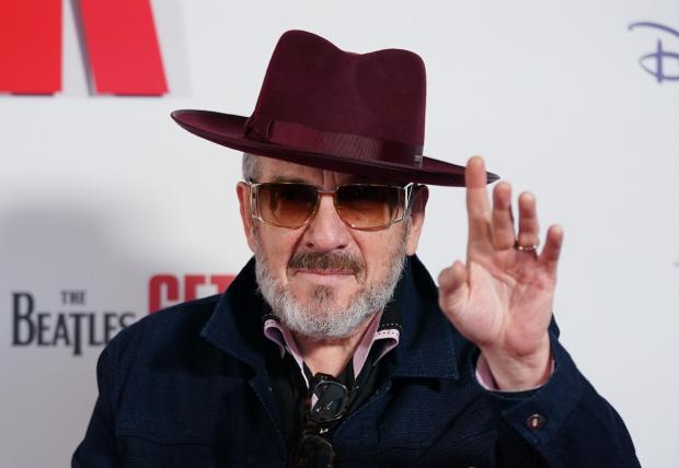 The Argus: Elvis Costello & the Imposters are heading to Brighton in June. Picture: PA