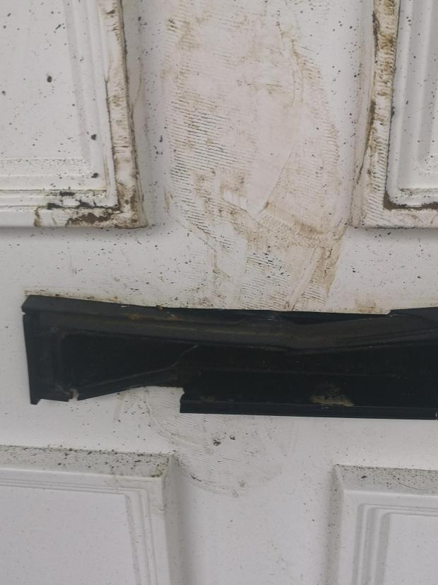 The Argus: The victim's front door following the attack