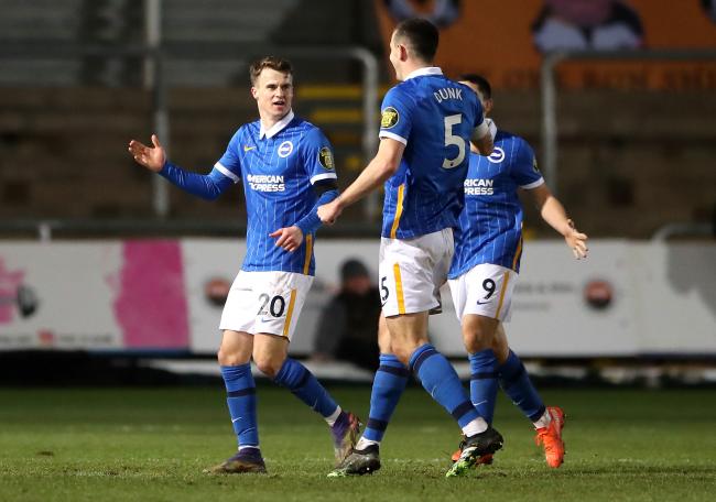 Solly March is congratulated by Lewis Dunk and Neal Maupay as Graham Potter sends out a strong team at Newport last season
