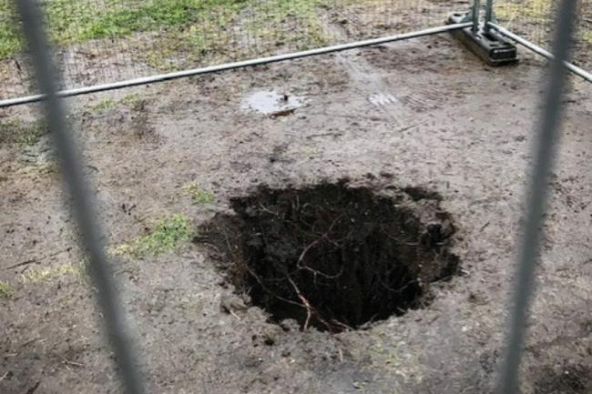 The 'sinkhole' in Old Steine Gardens is said to be half a metre deep