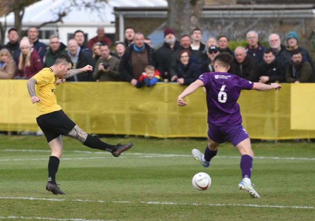 The Argus: George Gaskin slots home the Marigolds' first goal. Picture from Chris Gregory/Southern Combination Football League