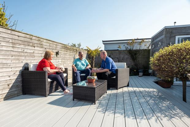 The Argus: Lakeland Verandahs’ Simon Crowter reflects on a successful installation with happy customers Alan Homans and Jan Lovett, at their Pevensey Bay home.