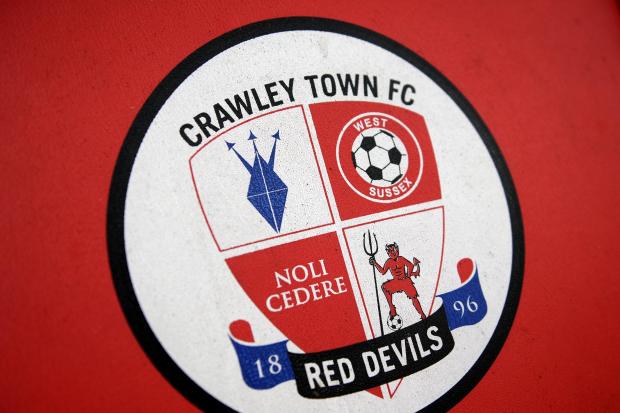 Crawley town have withdrawn from a game against Qatar SC