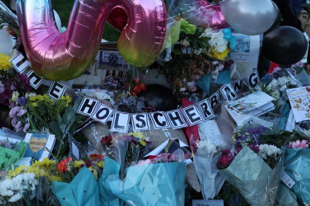 The Argus: Tributes for Arthur, including a sign saying "the Holscherbang"