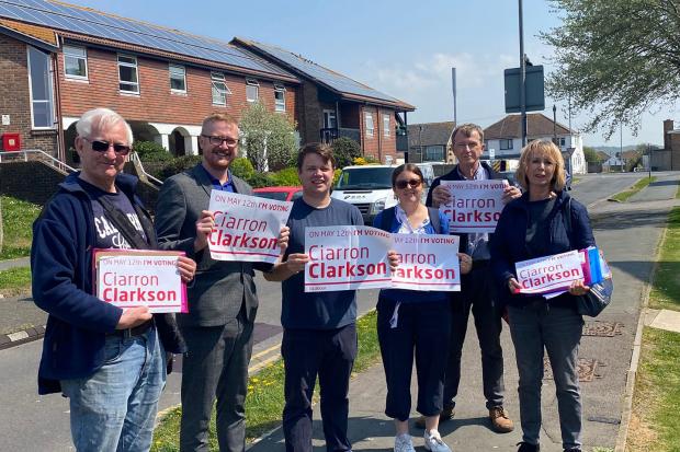 Newly-elected councillor Ciarron Clarkson, centre left, while campaigning with party activists and Kemp Town MP Lloyd Russell-Moyle, second left