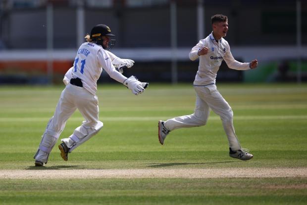 Archie Lenham celebrates a wicket at Leicestershire. Picture by John Mallett