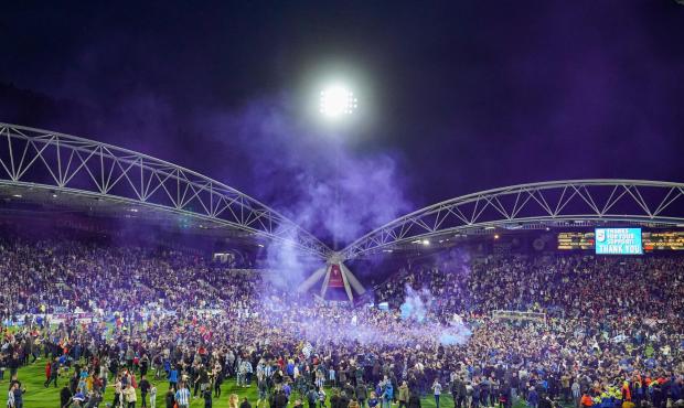 The Argus: Huddersfield Town fans stormed the pitch in celebration after a match earlier this week