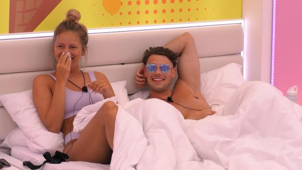 The Argus: Tasha and Andrew in bed on Love Island, tonight at 9pm on ITV2 and ITV Hub. Episodes are available the following morning on BritBox. Credit: ITV