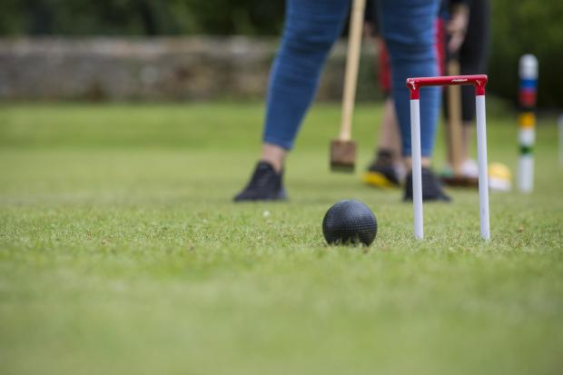 The Argus: Play croquet on the lawn at Petworth House this summer ©National Trust ImagesJames Dobson