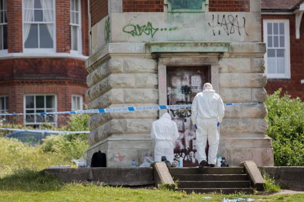 The Argus: Forensic teams at the clocktower. Picture by Dan Moon