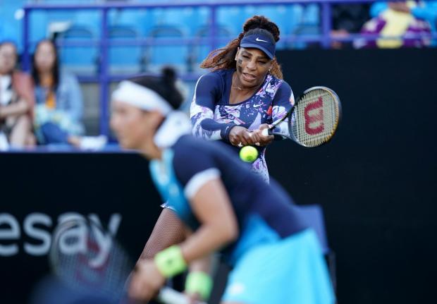 The Argus: Serena Williams, right, and Ons Jabeur during their ladies doubles match against Shuko Aoyama and Chan Hao-ching: credit - PA