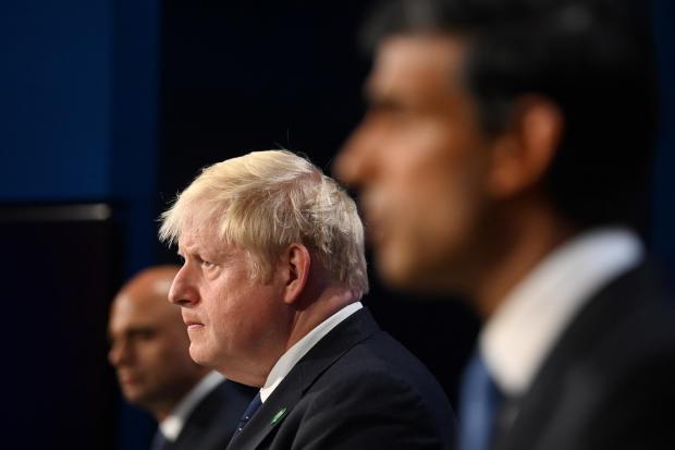 Rishi Sunak and Sajid Javid, both potential leadership rivals, offered sharp criticisms of Boris Johnson in their resignation letters (PA)